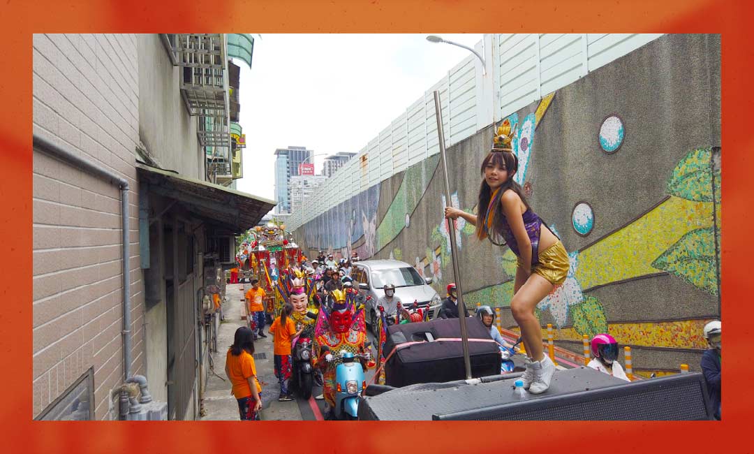A pole-dancing performance for a deity on the streets of Taiwan